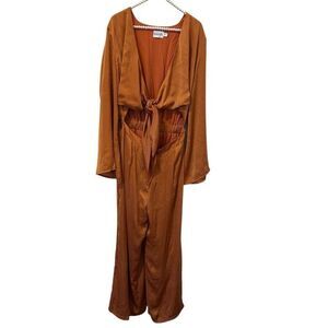Revolve SNDYS Pluto Jumpsuit Cutout Long Sleeve in Rust Orange Size M 6 elegant